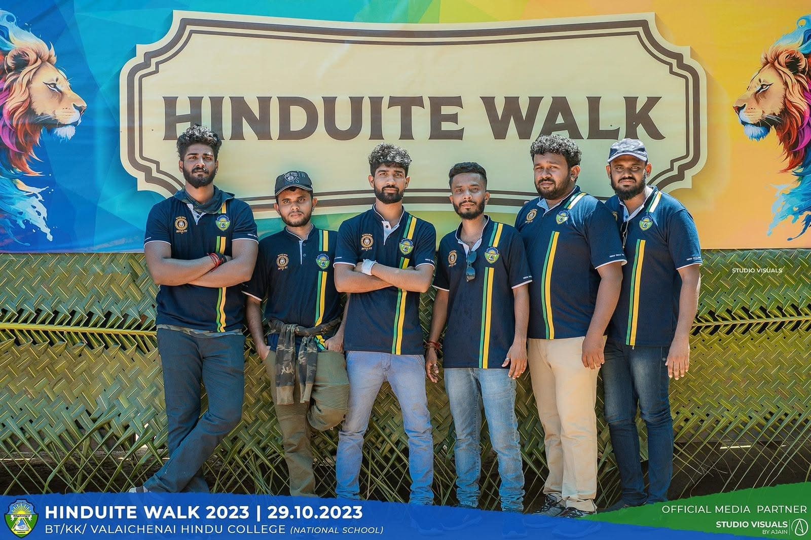 Valaichenai Hindu College Hinduite Walk team in navy striped polos